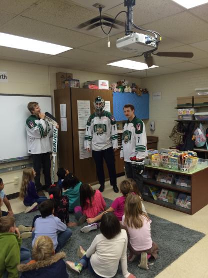 OHIO Hockey players visit elementary children in their classroom