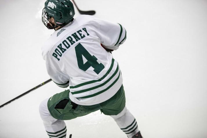 OHIO Hockey player skates past on the ice