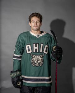 Will Cohen posing in his jersey