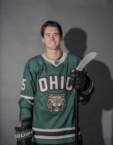 Hollander Thompson posing in his jersey