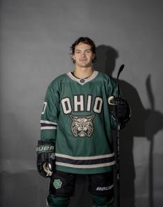 Drake Albers posing in his jersey